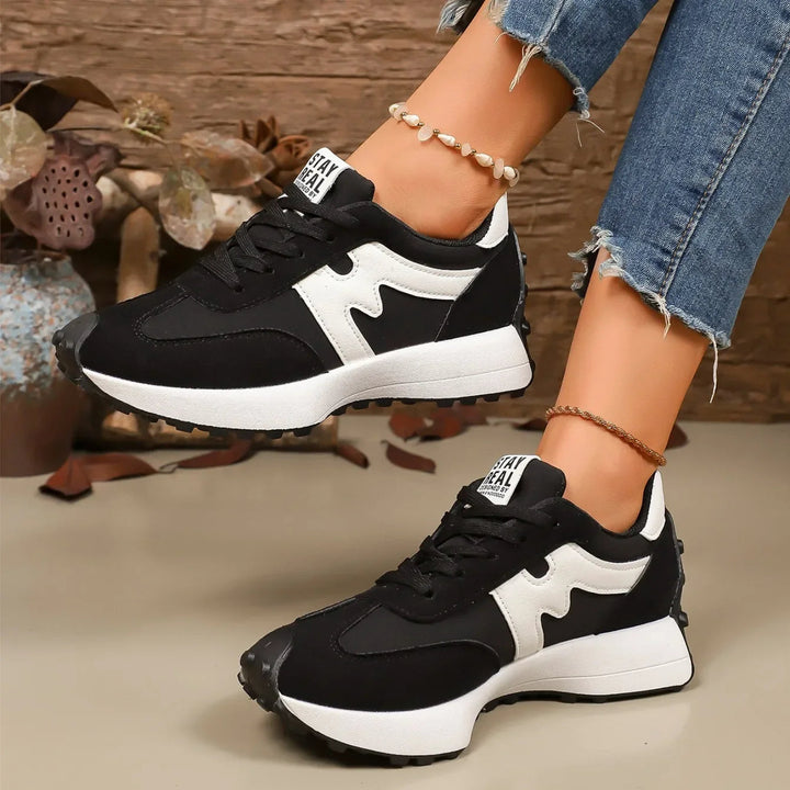 Trendy women's platform lace-up athletic sneakers, offering comfortable fashion footwear.
