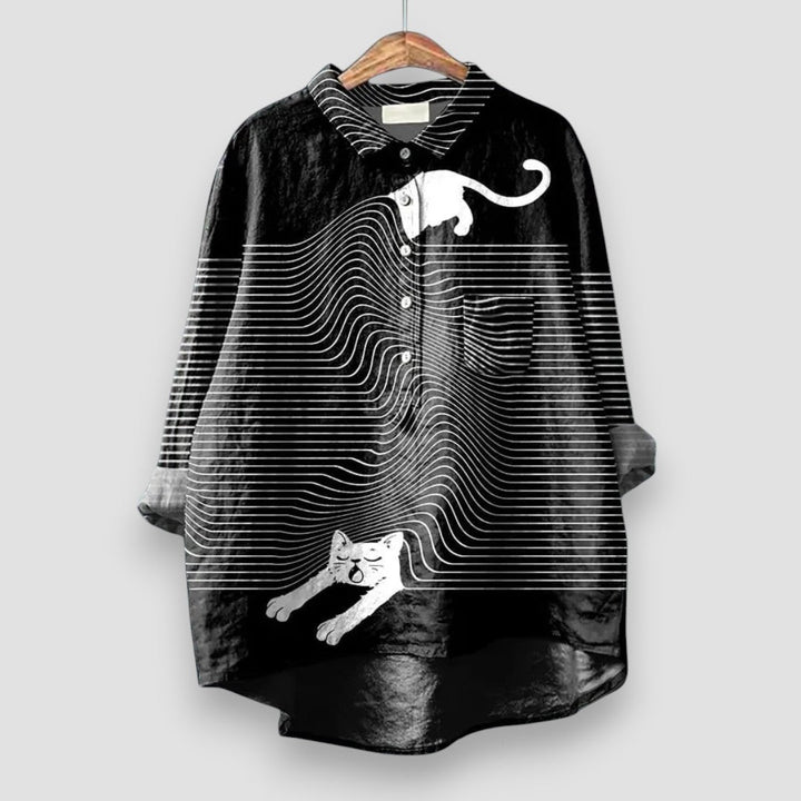 Everyday women's top with a charming dog print. Short sleeve blouse, a playful and cute addition to your casual wardrobe.