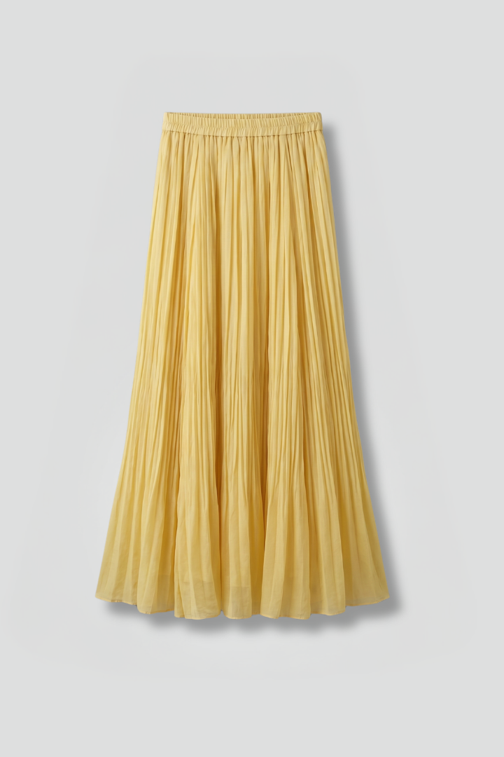 Women's pleated maxi skirt with elastic waist, perfect for effortless summer style & comfort.