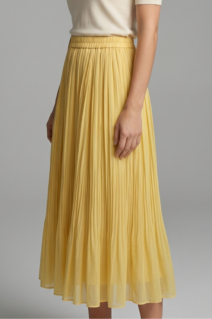 Effortlessly chic pleated maxi skirt for women, offering a comfortable elastic waist & flowy fit.