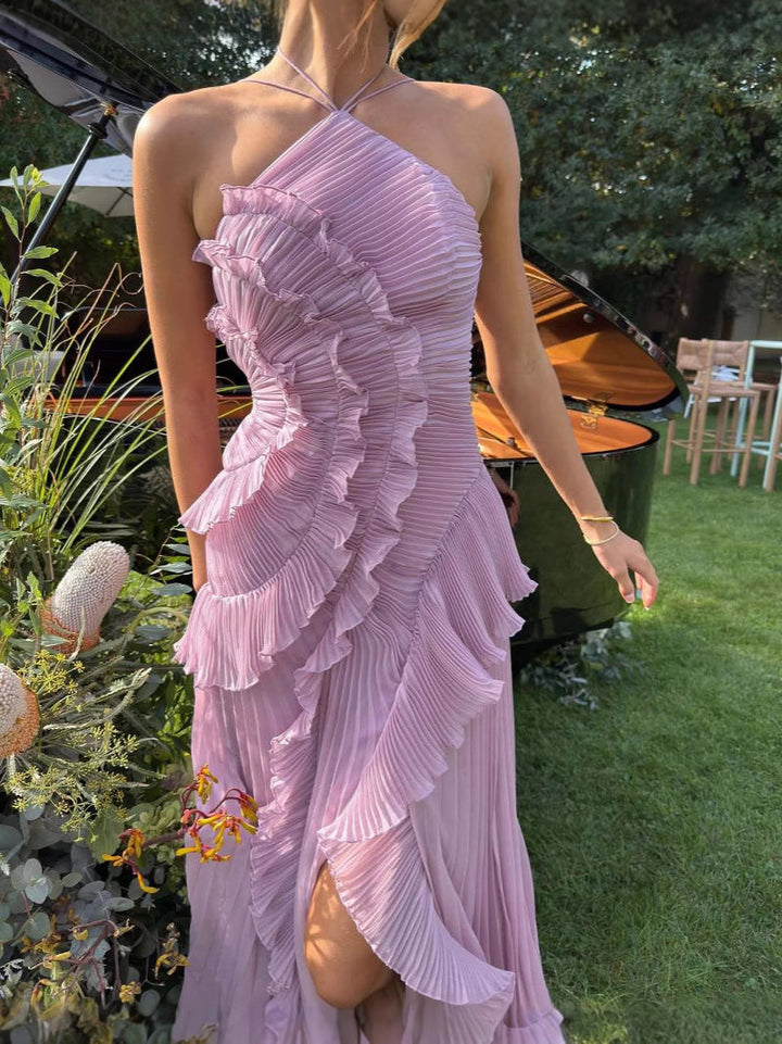 Graceful women's pleated midi dress with a flowing ruffle halter, perfect for formal occasions, evening, or party wear.