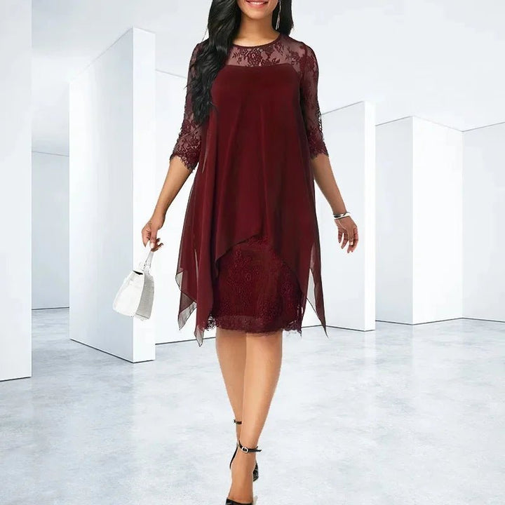Women's plus size elegant quarter sleeve lace dress with an asymmetrical hem, great for formal or party wear.