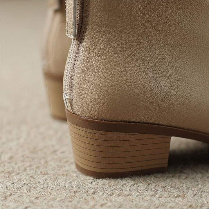 Elegant women's pointed toe ankle boots, easy slip-on, comfortable low heel for daily wear.