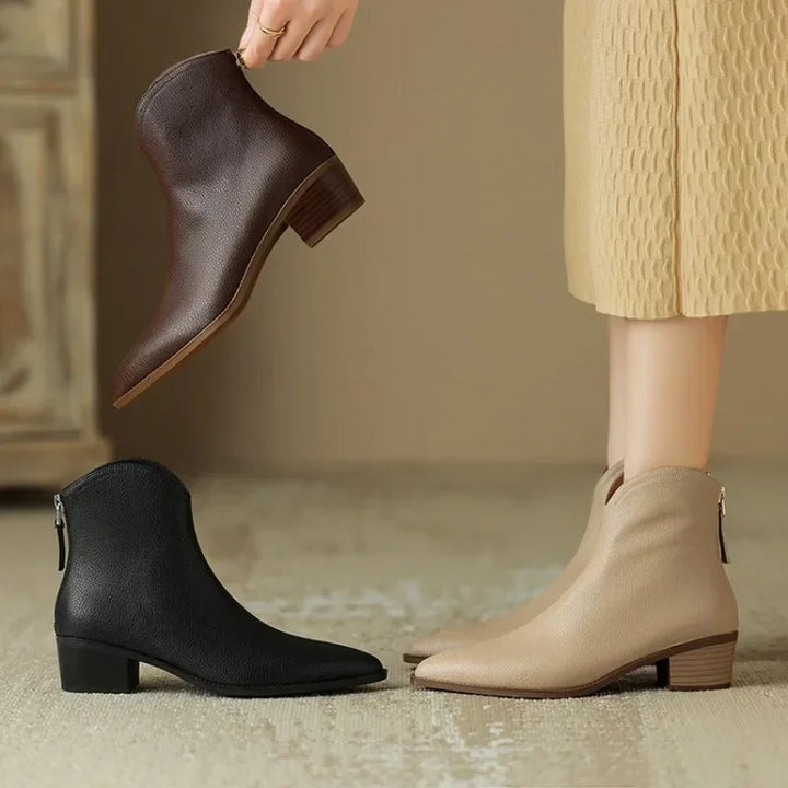 Practical & fashion-forward women's pointed toe ankle boots, low heel slip-on design.