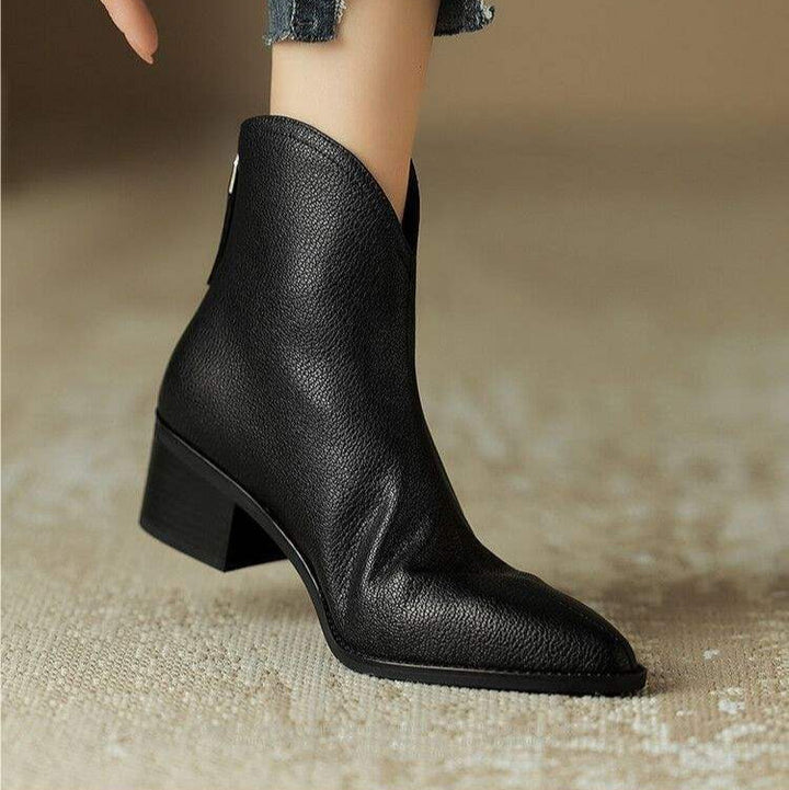 Women's elegant pointed toe ankle boots, slip-on with low heel, ideal for office.