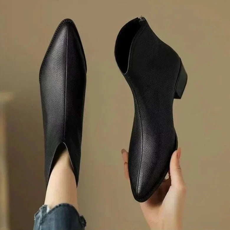 Fashionable & comfortable women's pointed toe ankle boots, low heel slip-on.