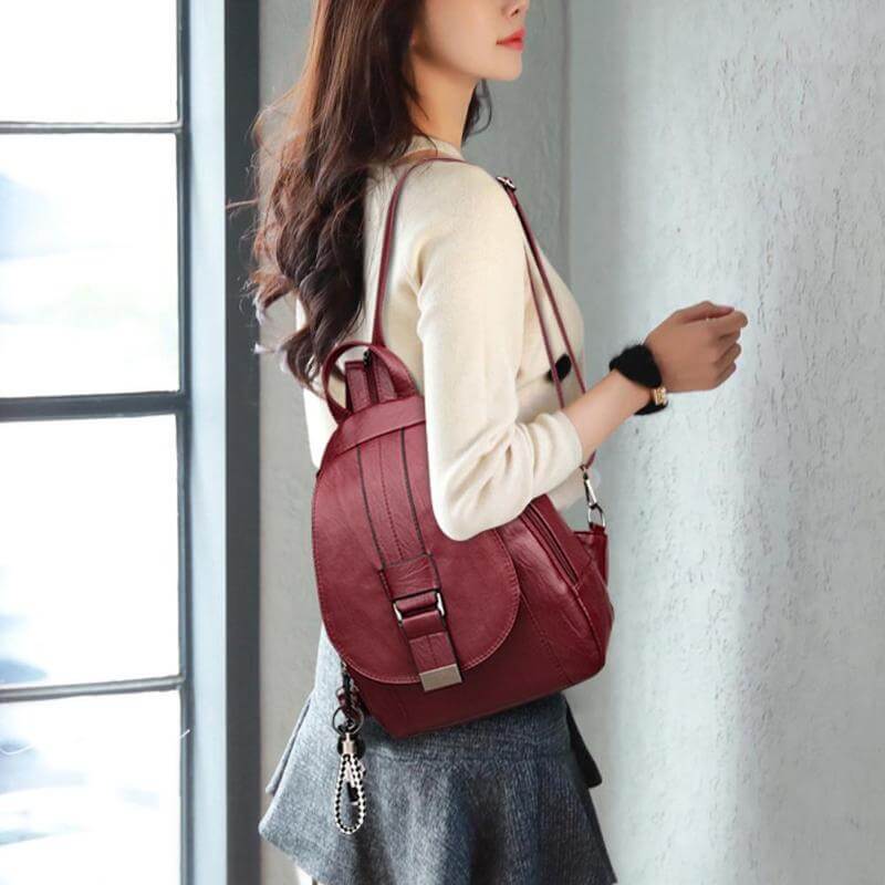 Travel-ready women's water-resistant leather backpack, durable and elegantly designed.