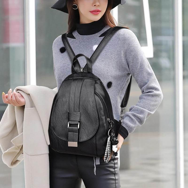 Commute-friendly women's premium leather backpack, water-resistant, ample storage.
