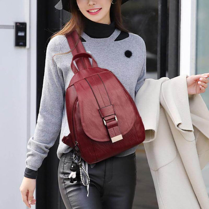 Fashion-forward women's water-resistant leather backpack, blending style & practicality.