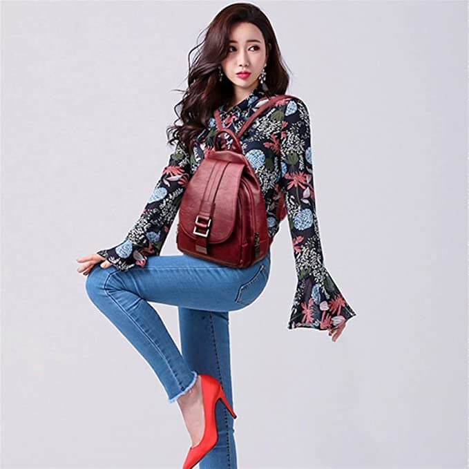 Elegant women's premium leather backpack, water-resistant, enhancing any outfit.
