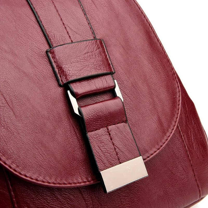 Sleek women's premium leather water-resistant backpack, designed for modern travelers.