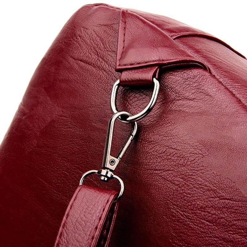 Trendy women's water-resistant leather backpack, combining fashion & weather protection.
