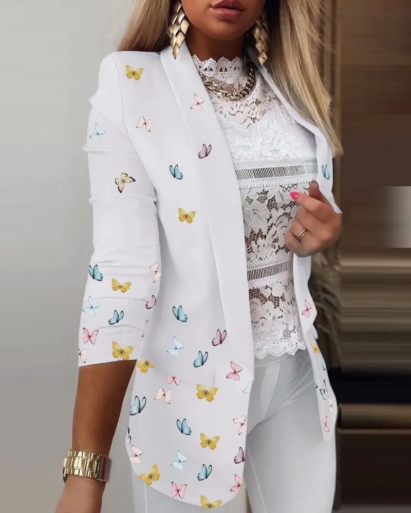 Effortless women's printed 3/4 sleeve open front blazer. A chic and versatile statement piece for modern style.