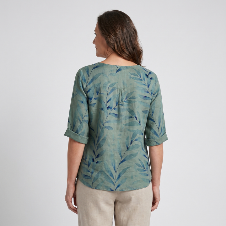 Casual chic women's printed top, perfect for elegant everyday wear with asymmetric buttons.