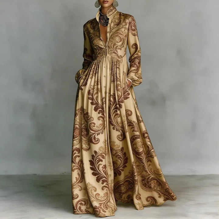Flowy women's printed maxi dress featuring a stand collar, long sleeves, and high waist. Bohemian summer style.