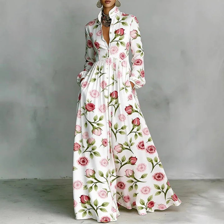 Vibrant printed bohemian maxi dress for women, with stand collar, long sleeves, & flowy design. Summer chic.