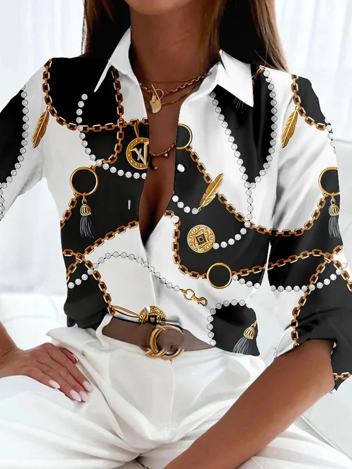 Effortless style with this women's printed button-down blouse. A casual chic three-quarter sleeve top for everyday comfort.