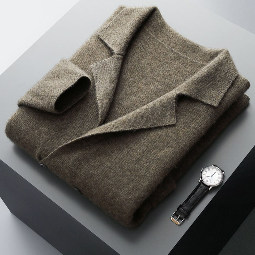 Pure cashmere v-neck cardigan sweater displayed folded, showcasing the soft luxury knitwear