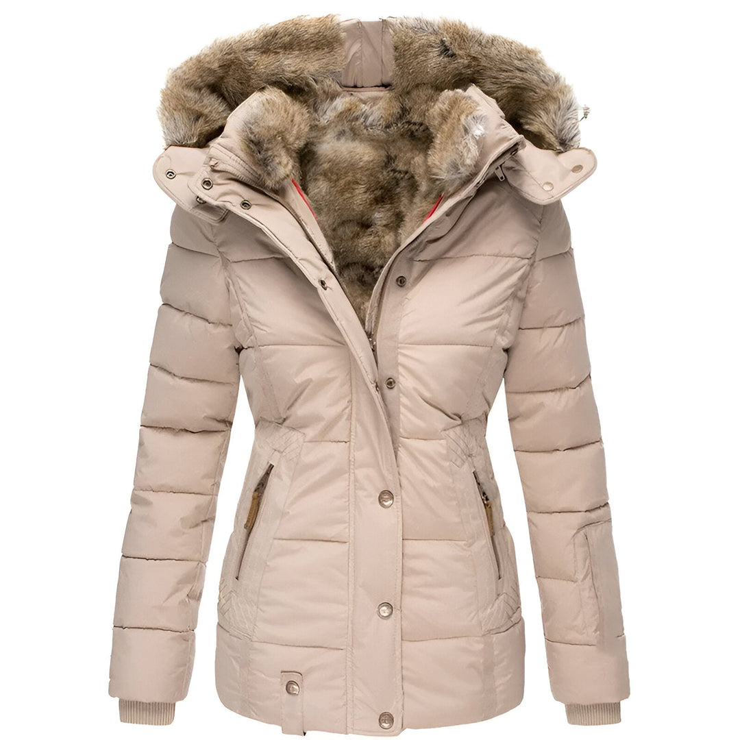 Side profile of a women's puffer jacket, highlighting its feminine fit and cozy faux fur hood.