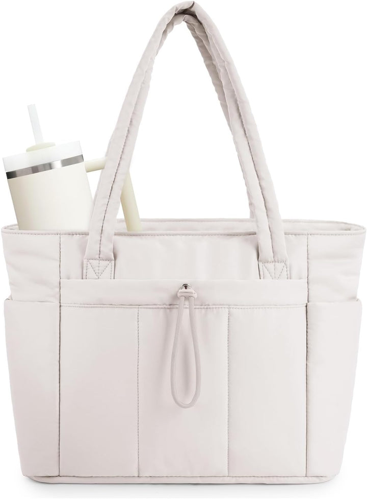 Women's quilted puffer tote bag with laptop sleeve and cup holder.