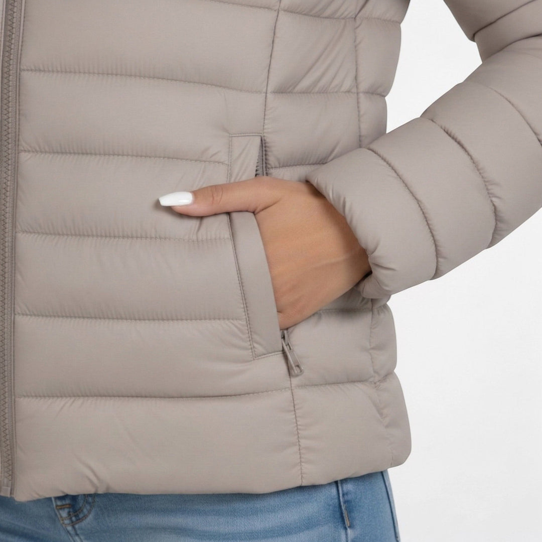 Lightweight women's quilted jacket with a stylish stand collar for warmth and comfortable outerwear.