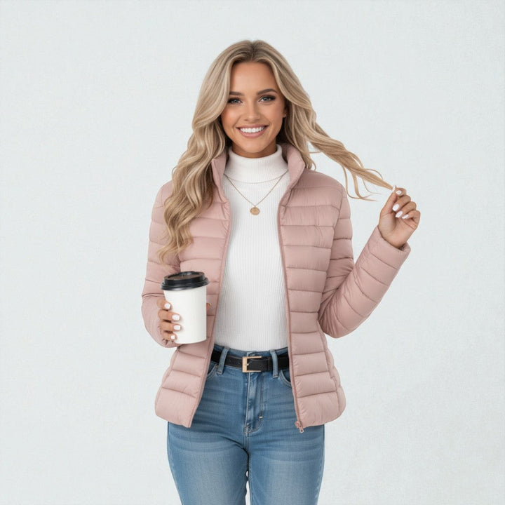 Versatile women's quilted lightweight jacket with a stand collar, great for everyday casual wear & layering.