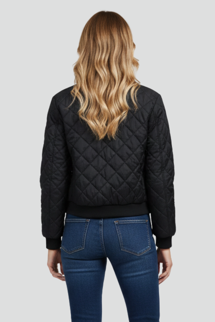 Fashionable women's quilted zip jacket offering effortless style and comfort, great for autumn & spring outerwear.