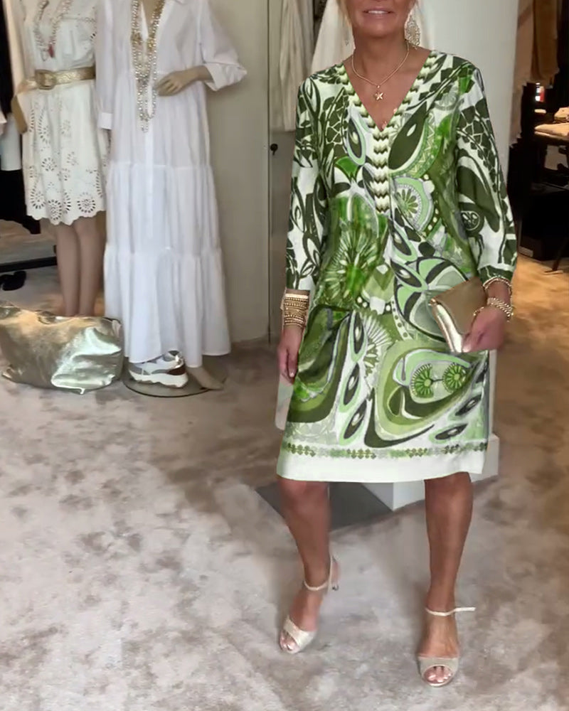 Bohemian sunburst printed tunic dress, loose fit for a chic and casual summer look.
