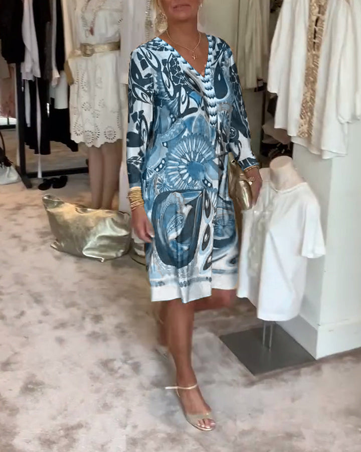 Radiant sunburst casual tunic dress, a vibrant printed women's dress for summer fashion.