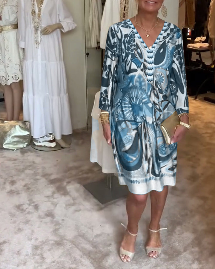 Loose fit sunburst printed tunic, women's dress with artistic boho style for summer.