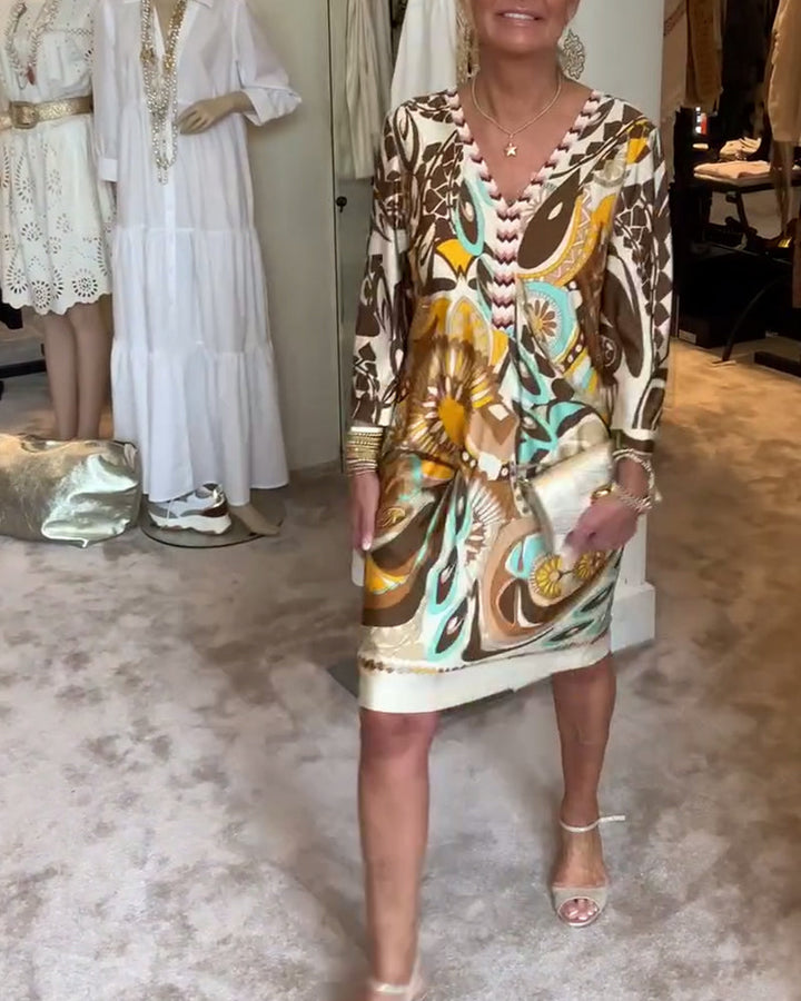 Loose fit sunburst print women's tunic dress for artistic vacation fashion.