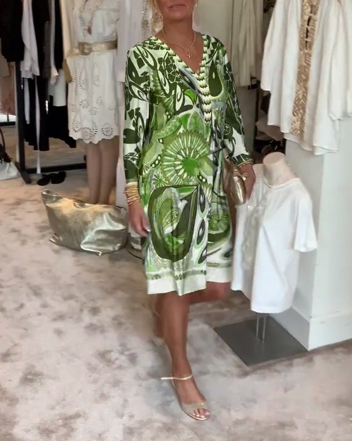 Vacation-ready sunburst print tunic dress for women, vibrant and comfortable casual wear.