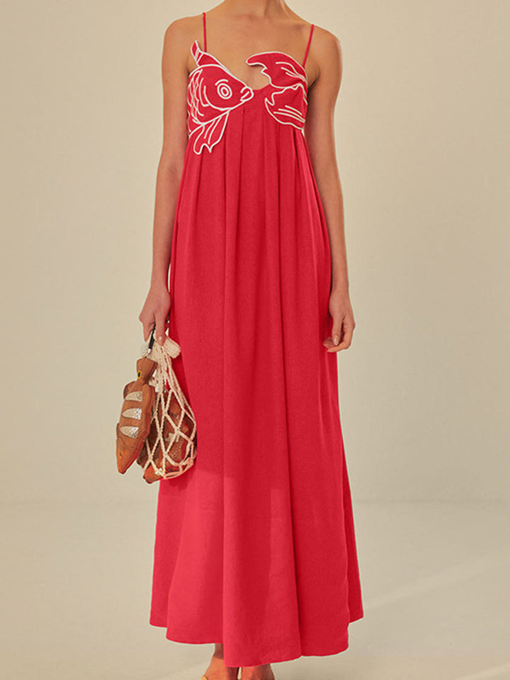 Women's red embroidered maxi shift dress with spaghetti straps for summer, beachwear, or vacation. Flowing fit.