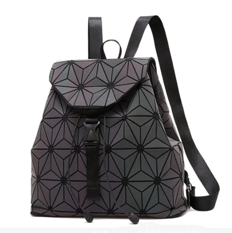 Close-up of luminous geometric pattern on a women's reflective color-changing backpack.