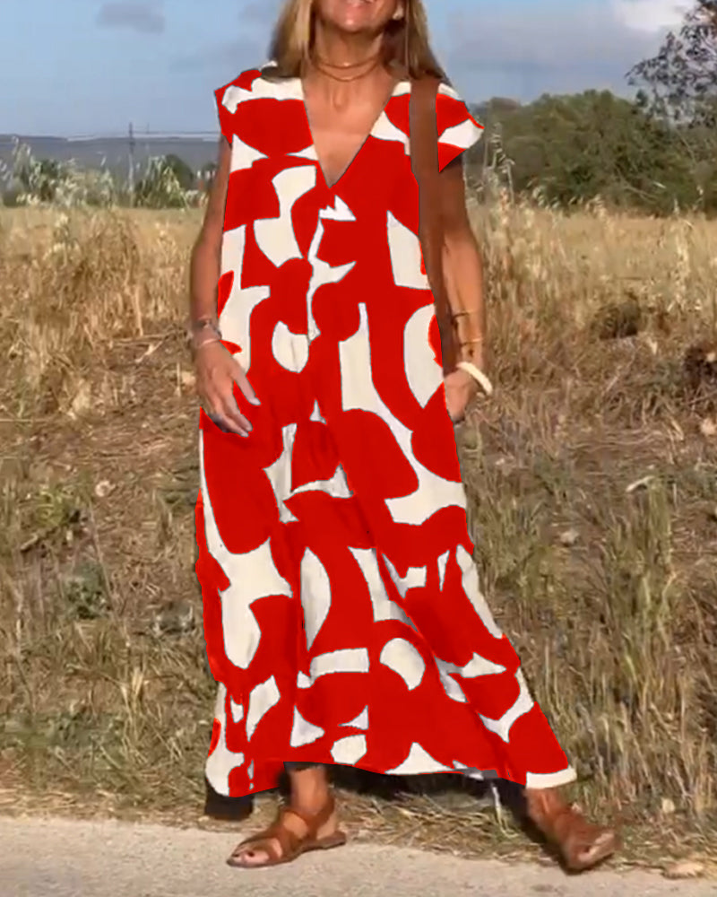 Flowy women's abstract dress, relaxed fit. Perfect casual summer dress with a modern design.
