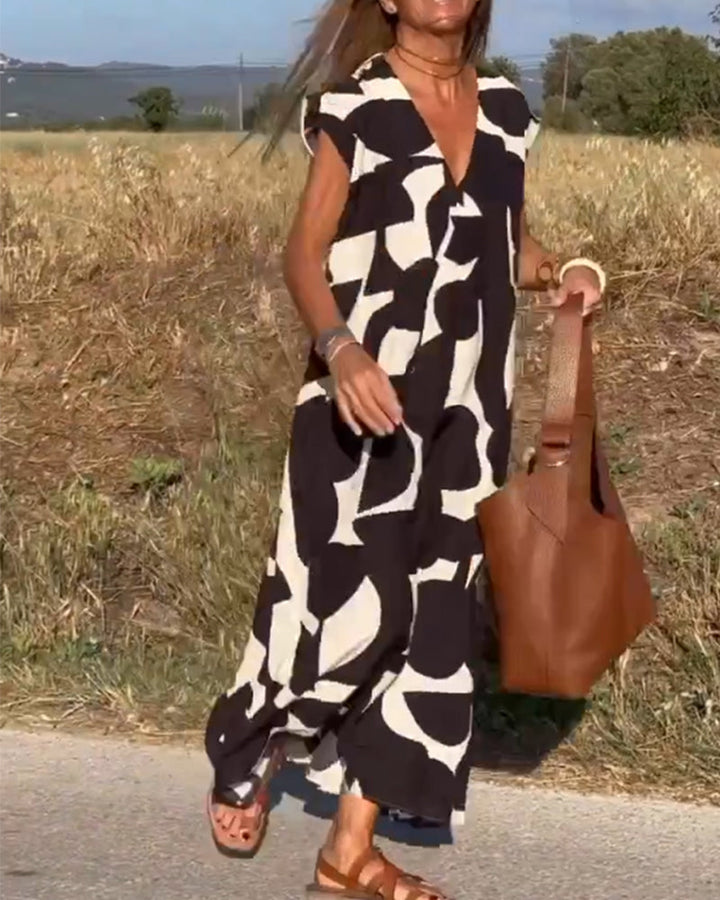 Women's casual abstract dress, V-neck & cap sleeves. Flowy, comfortable, perfect for summer days.