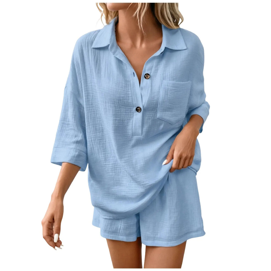 Women's two-piece collared top & drawstring shorts set. Relaxed fit beachwear for summer vacation.