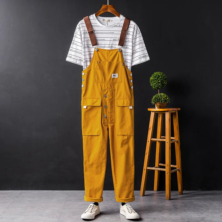Trendy women's relaxed fit denim overalls, a comfortable sleeveless jumpsuit for summer and spring outfits.