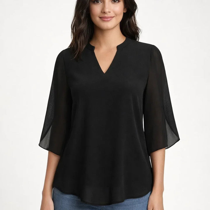 Women's relaxed fit blouse, versatile for stylish everyday wear.