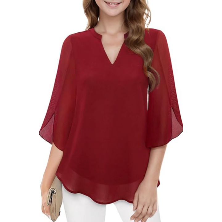 Women's relaxed fit long sleeve blouse, stylish and comfortable for fashion-forward looks.