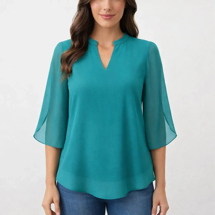 Stylish women's long sleeve blouse, perfect for an elegant casual chic look.