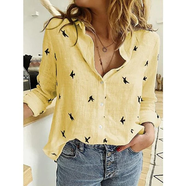 Womens button-down blouse, relaxed fit, with elegant point collar. Perfect for versatile everyday wear.