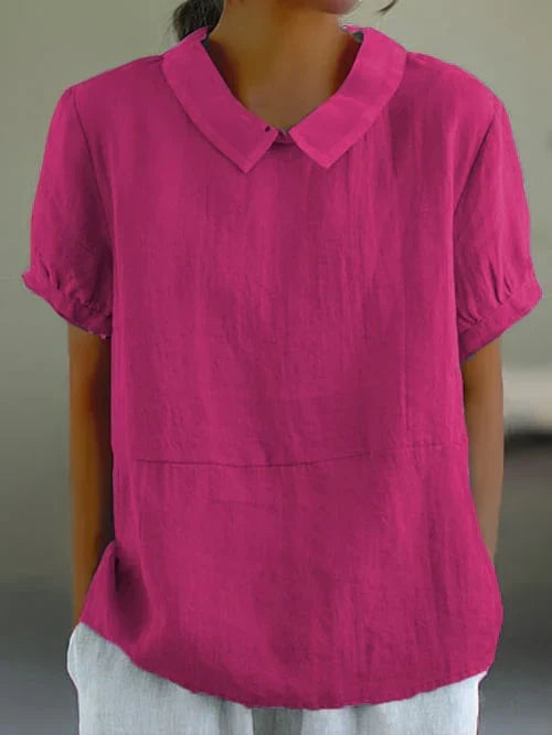 White women's relaxed fit blouse with Peter Pan collar. Short sleeve, casual everyday wear summer top.