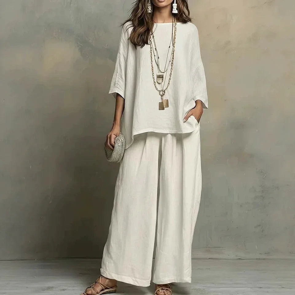 Breathable women's two-piece pant set with wide legs & relaxed fit, great for warm weather or travel.