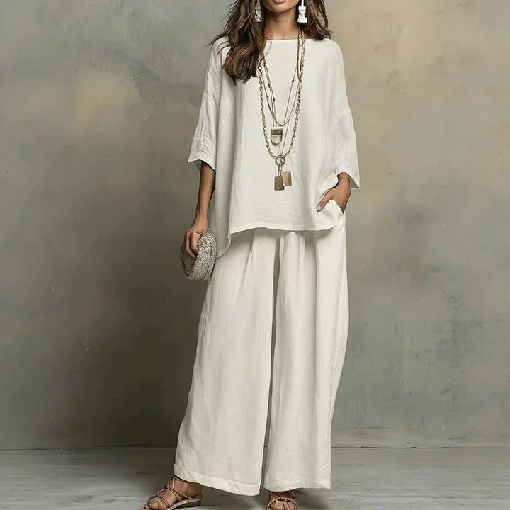 Breathable women's two-piece pant set with wide legs & relaxed fit, great for warm weather or travel.