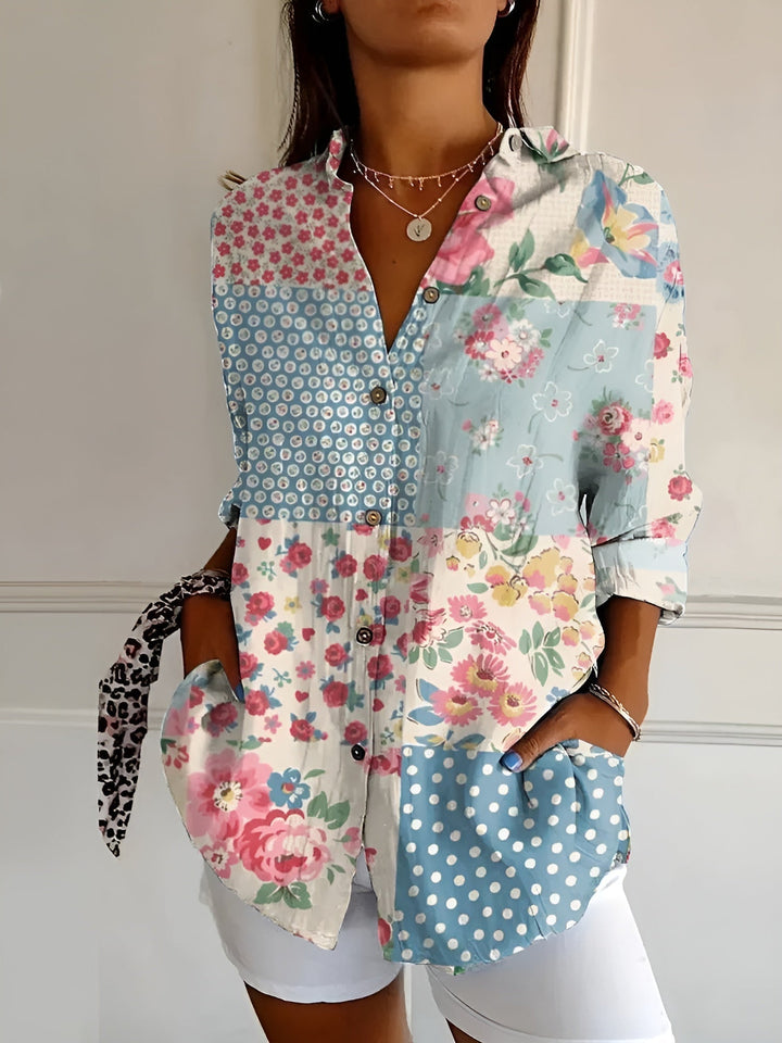 Chic women's button-down blouse, relaxed fit, V-neck, long sleeve. Ideal for workwear or sophisticated casual looks.