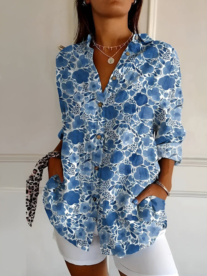 Women's relaxed fit V-neck blouse, button-down front & long sleeves. A comfortable & stylish everyday top.