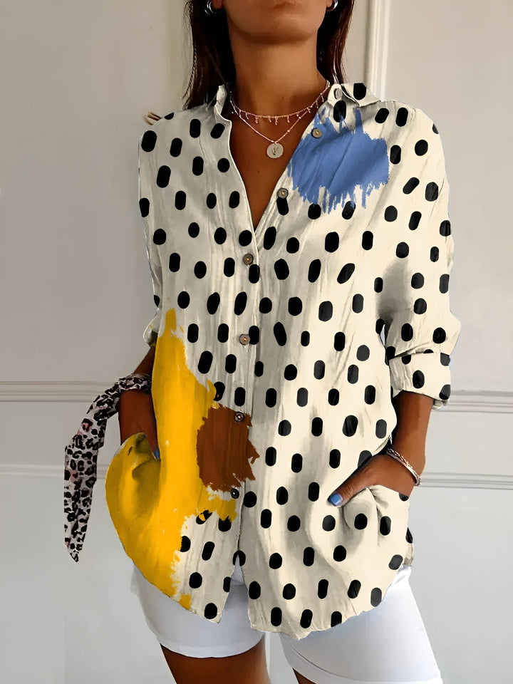 Sophisticated women's long sleeve blouse, relaxed button-down fit, V-neck. Chic top for work, casual, everyday fashion.