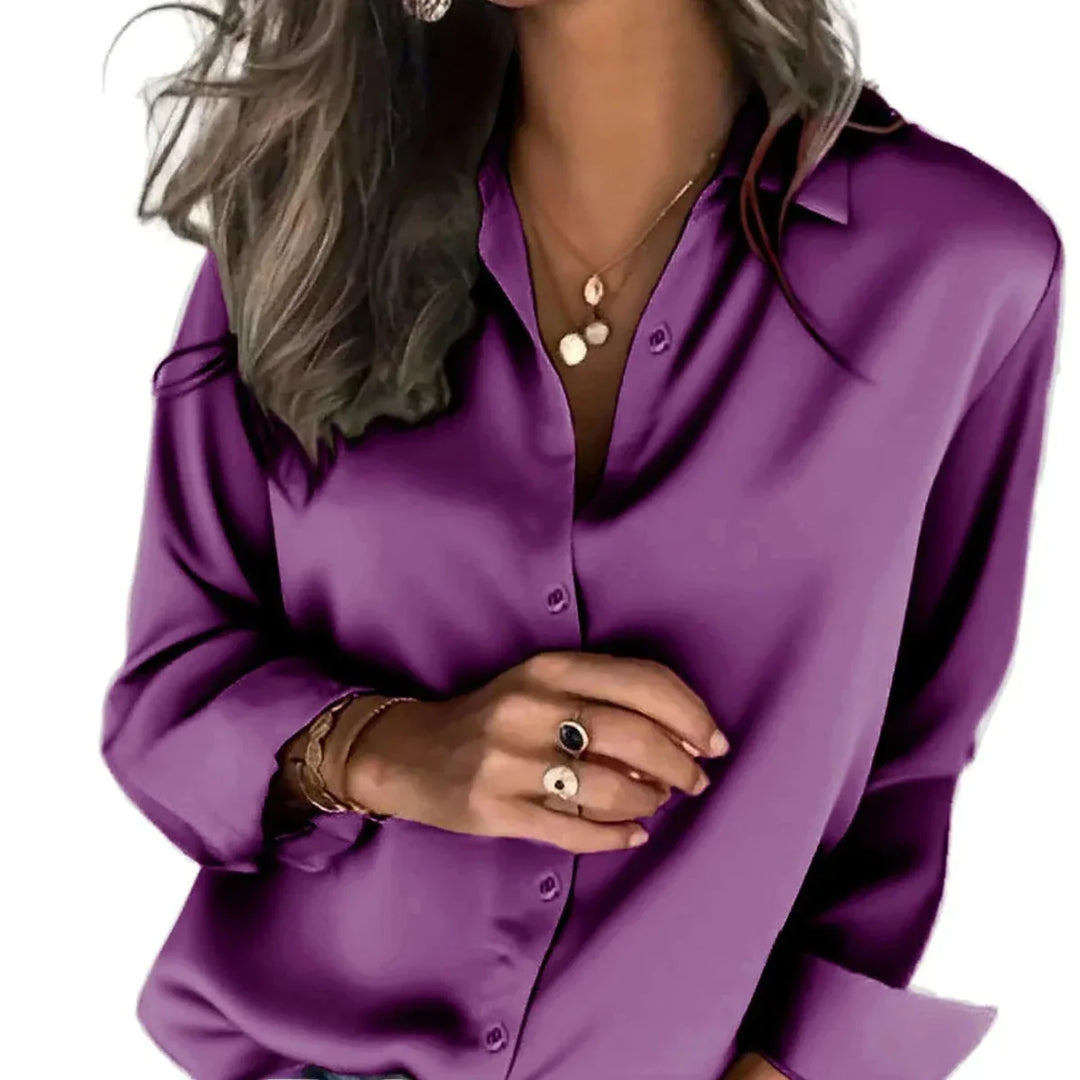 Women's relaxed fit button-down shirt, long sleeve, stylish & comfortable for versatile wear.