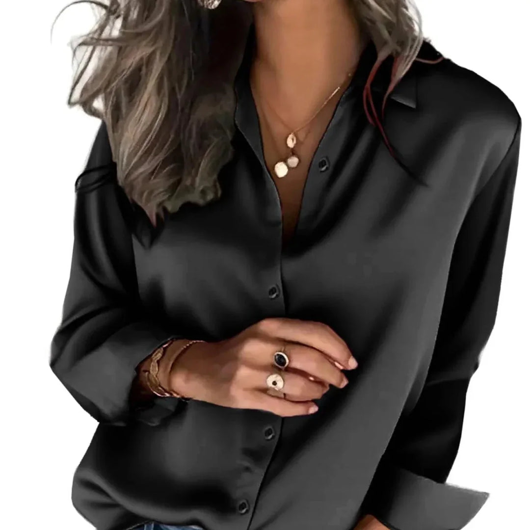 Effortless women's relaxed fit button-down blouse, comfortable & chic for everyday style.